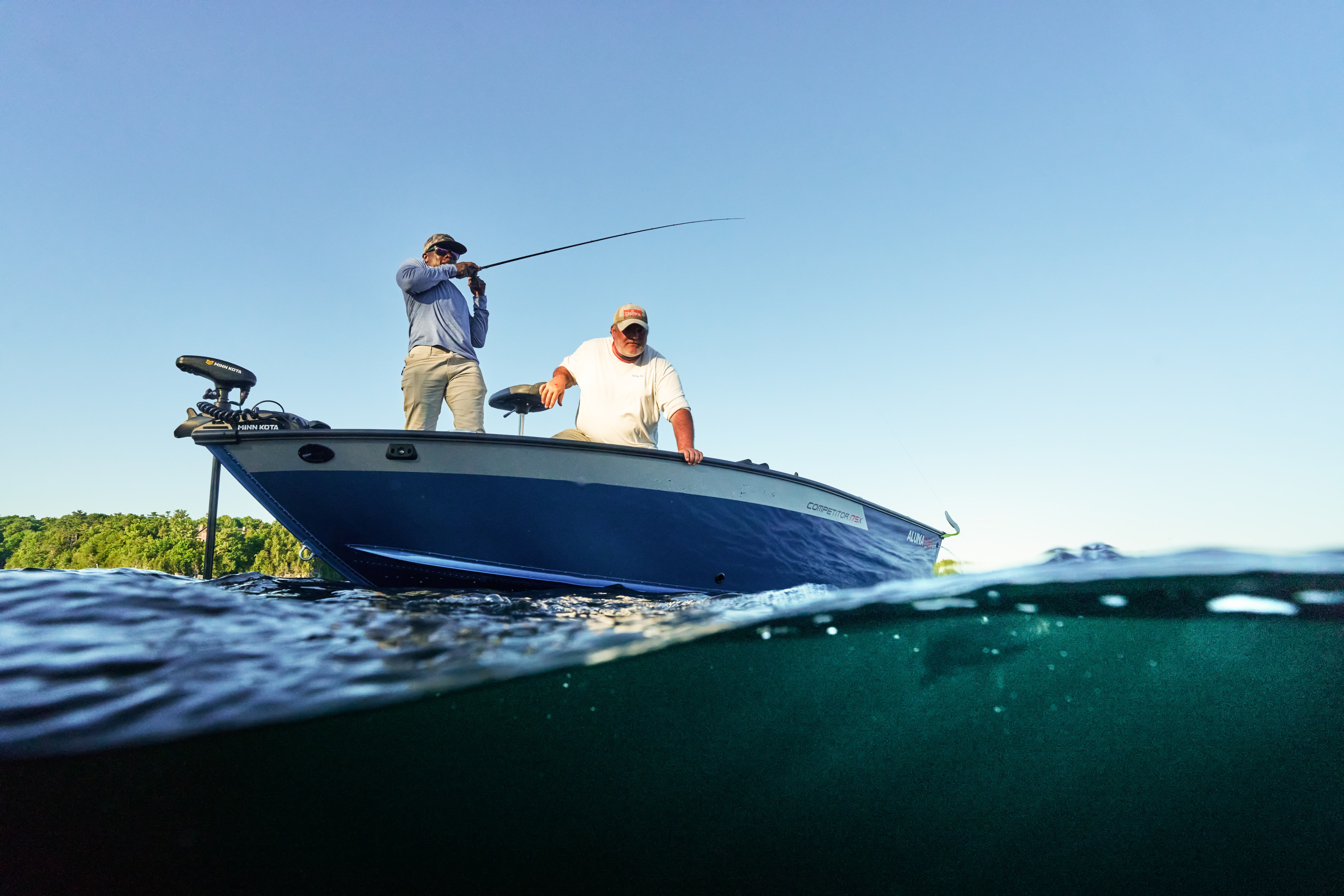 View of the azure blue fishing boat Alumacraft Competitor 175 2025