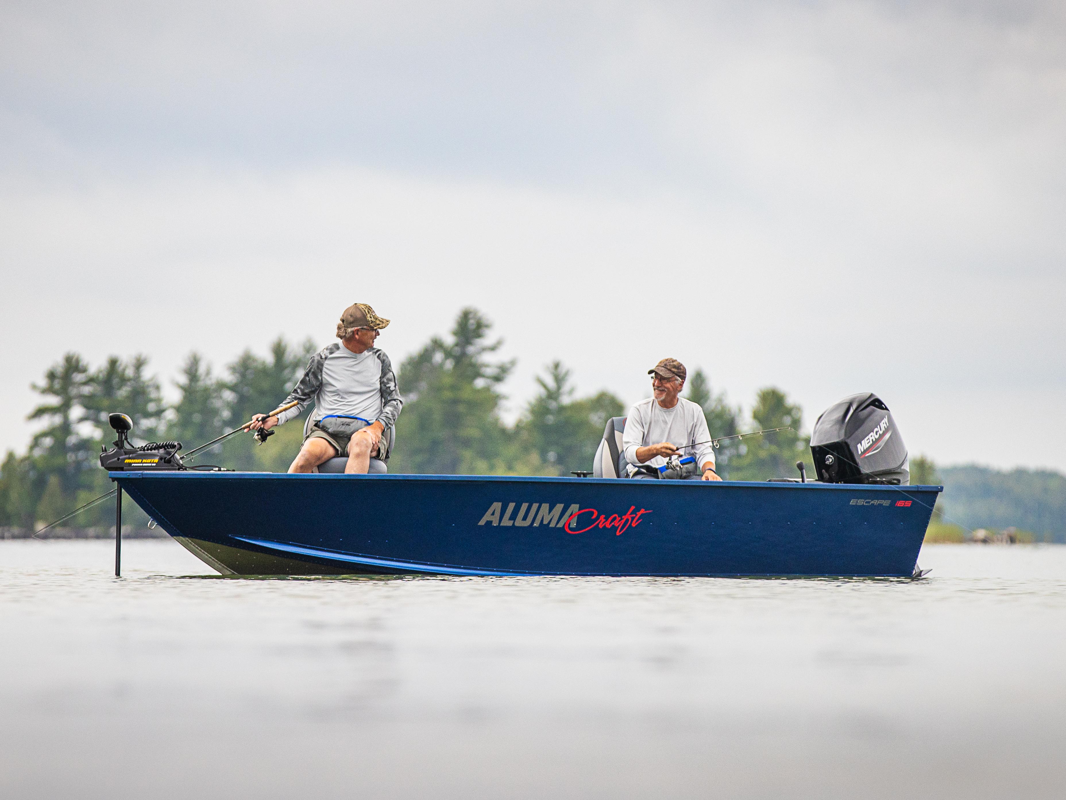 Two men fishing on a multi-species Alumacraft Escape 165 2025