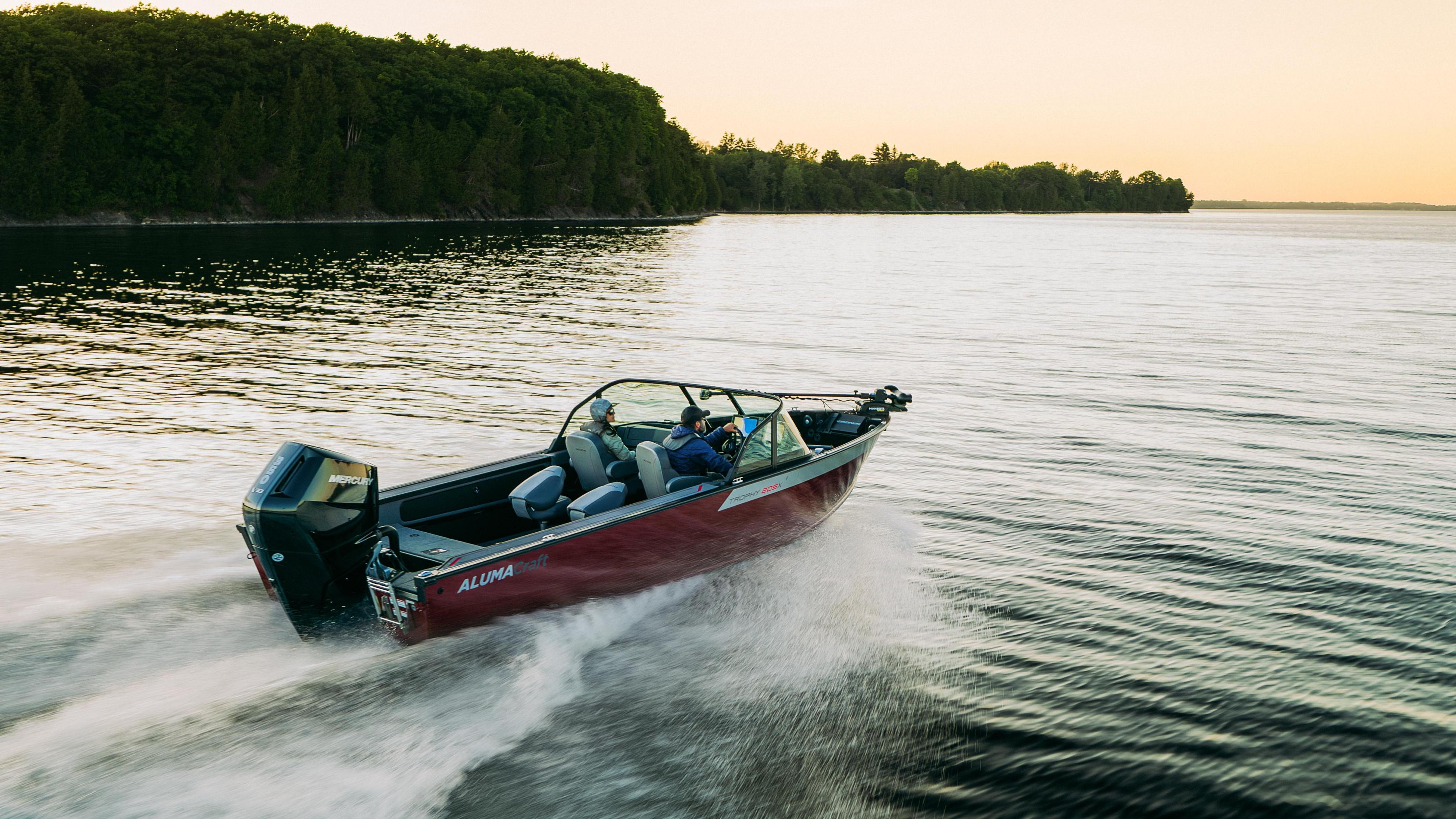 A fishing couple sailing the 2025 Alumacraft Trophy 205x aluminum boat