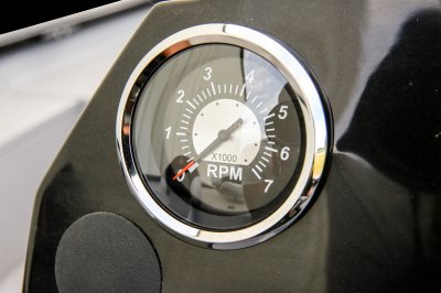 Speedometer on the Black Dashboard of an Alumacraft 175 Prowler Bass Boat