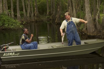Two Men Fishing in Alumacraft 1442 Jon Boat