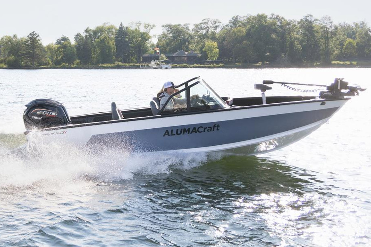 Jay Siemens fishing from his Alumacraft on lake 